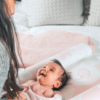 SuperSnug Baby Changing Mat Award Winning baby on pink