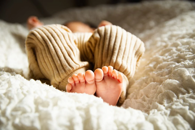 Creating Magical Moments for Baby's Optimal Sleep with Bedtime Rituals - baby's feet